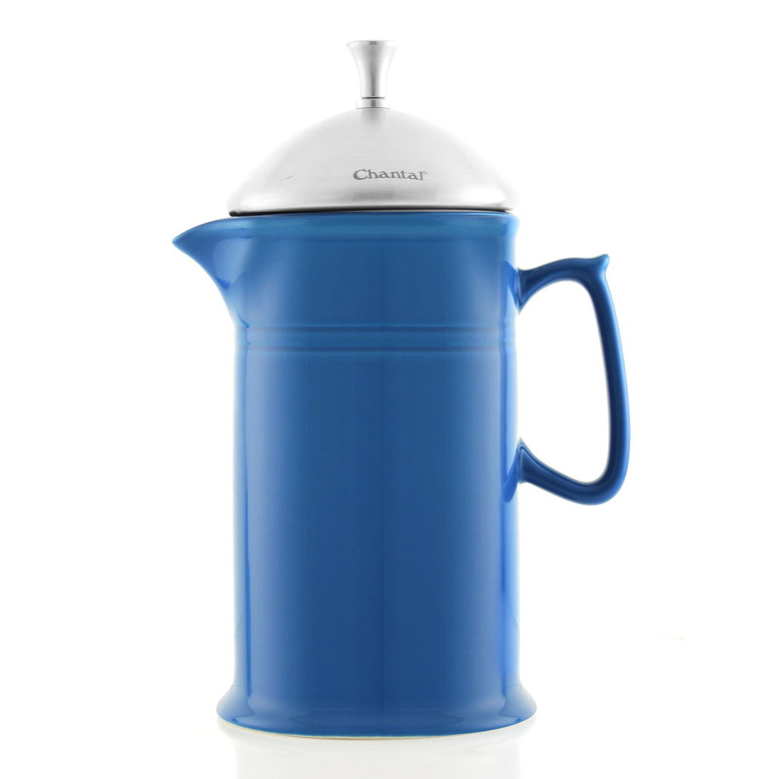 side view of ceramic french press with stainless steel plunger in blue